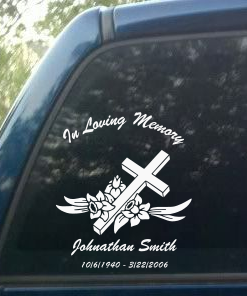 Photo of personalized memorial decal sticker featuring cross and flowers